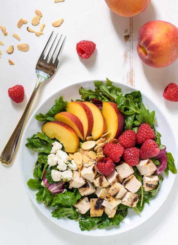 salad with peaches, raspberries, chicken and feta