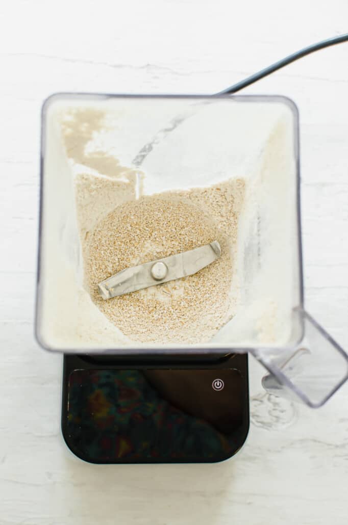 overhead shot of oats ground in a blender
