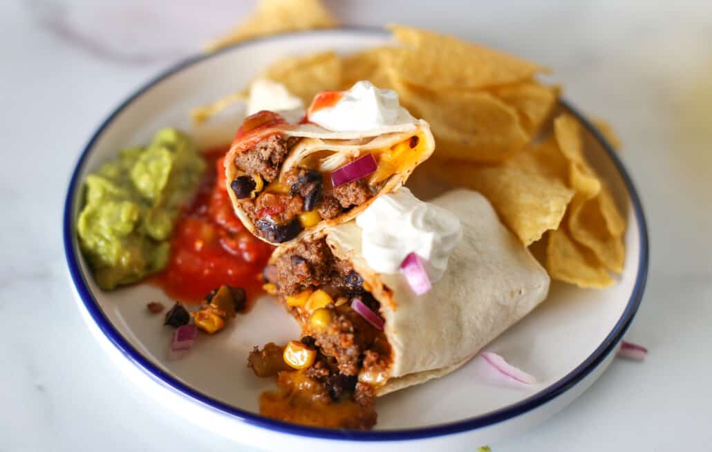 Close up shot of beef burrito recipe on a plate