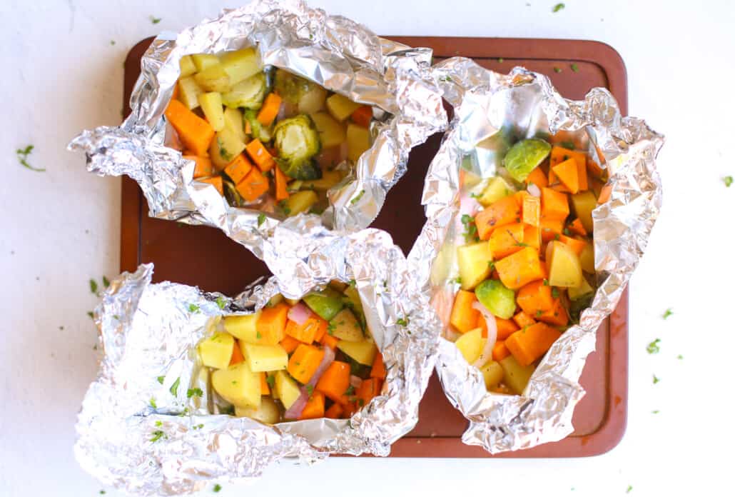 Overhead shot of cooked vegetables in foil 