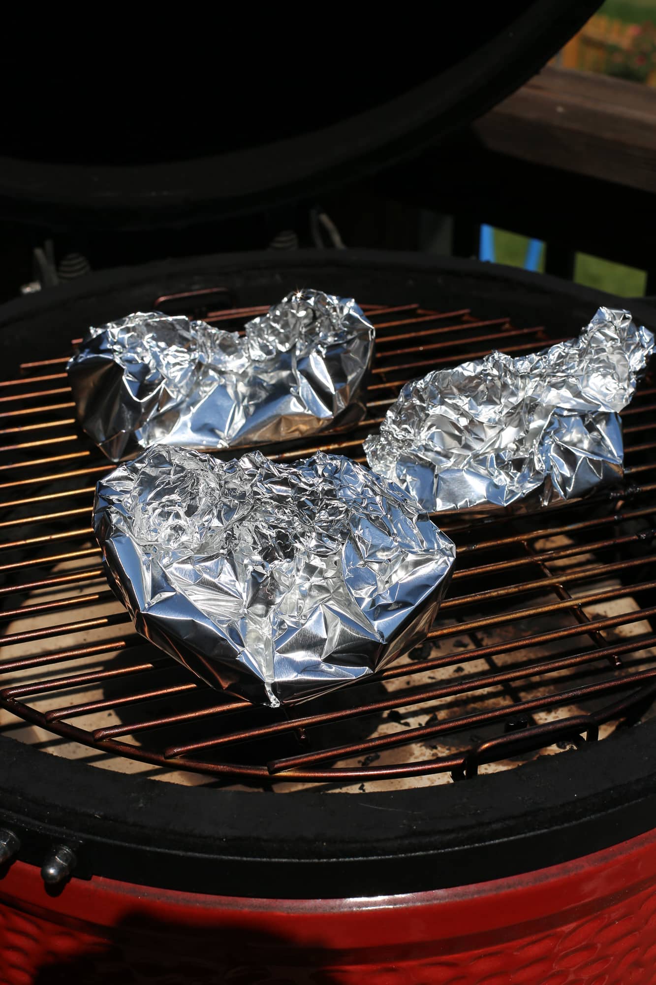Foil packs of vegetables on the grill 