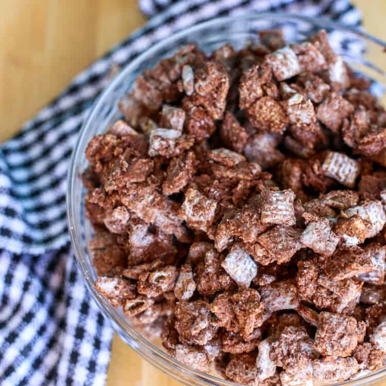 Puppy chow in a glass bowl ready to serve.