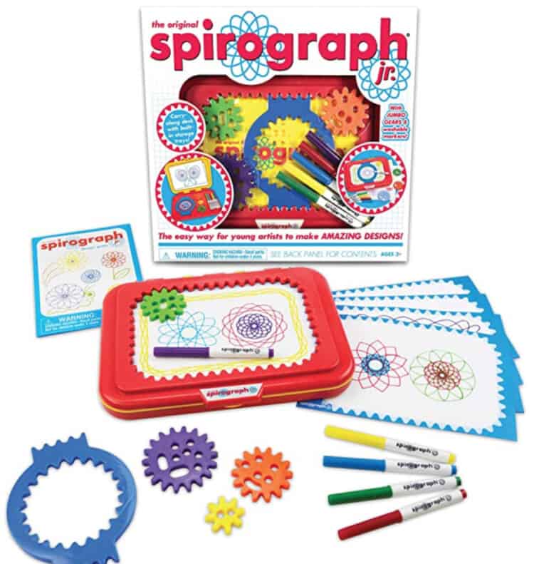 Stock photo of a Spirograph box with all the contents laid out in front of it.