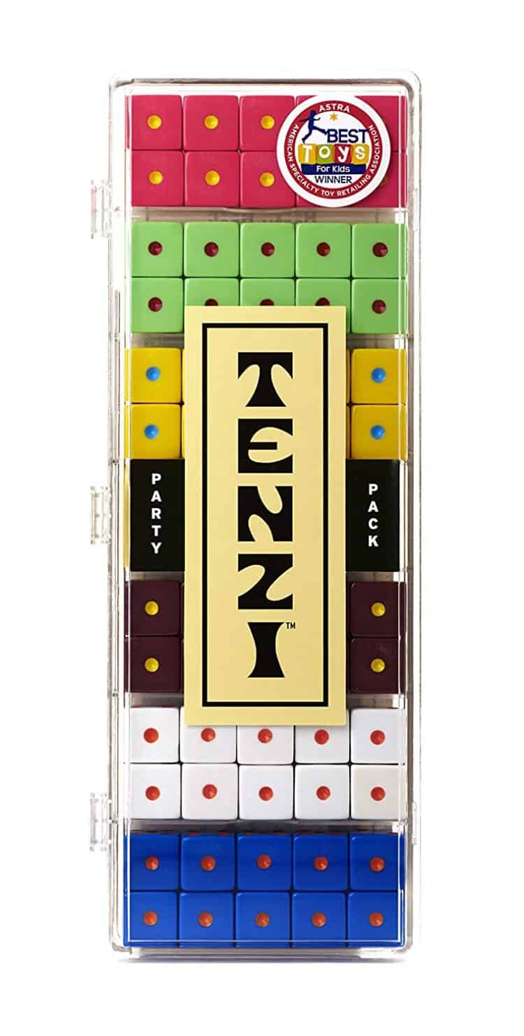 Stock photo of the game Tenzi - a clear plastic case with different colors of dice in it.