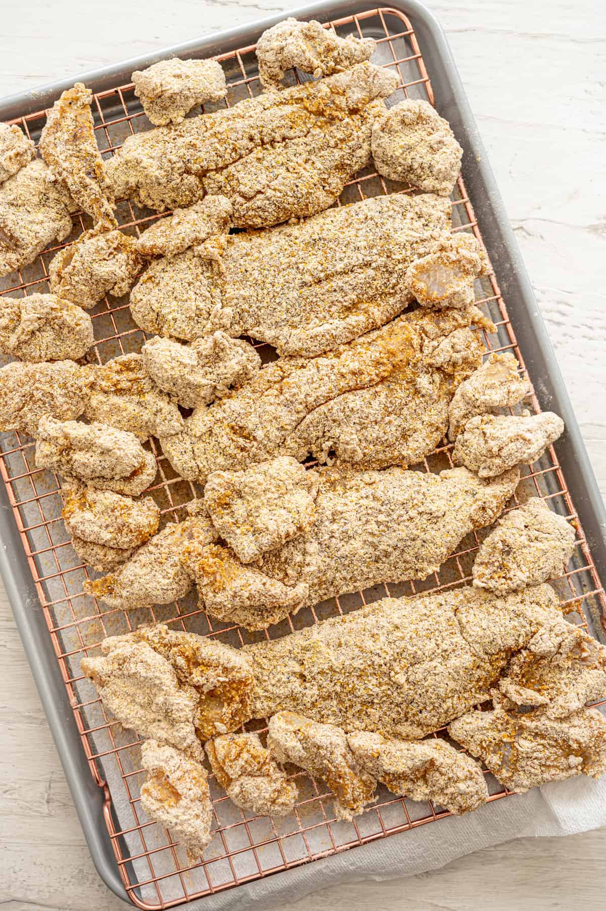 Catfish fillets and nuggets that have been dredged.