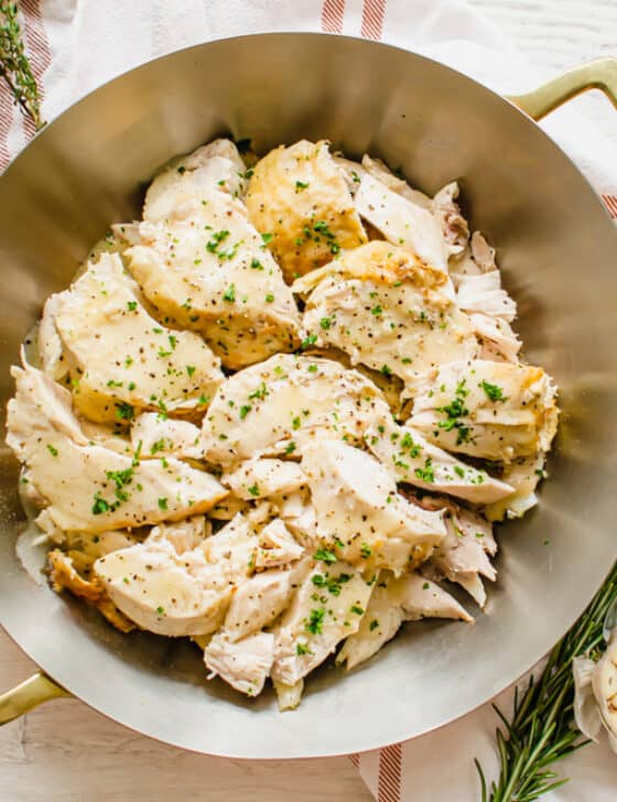 chicken sliced from whole chicken on a serving platter