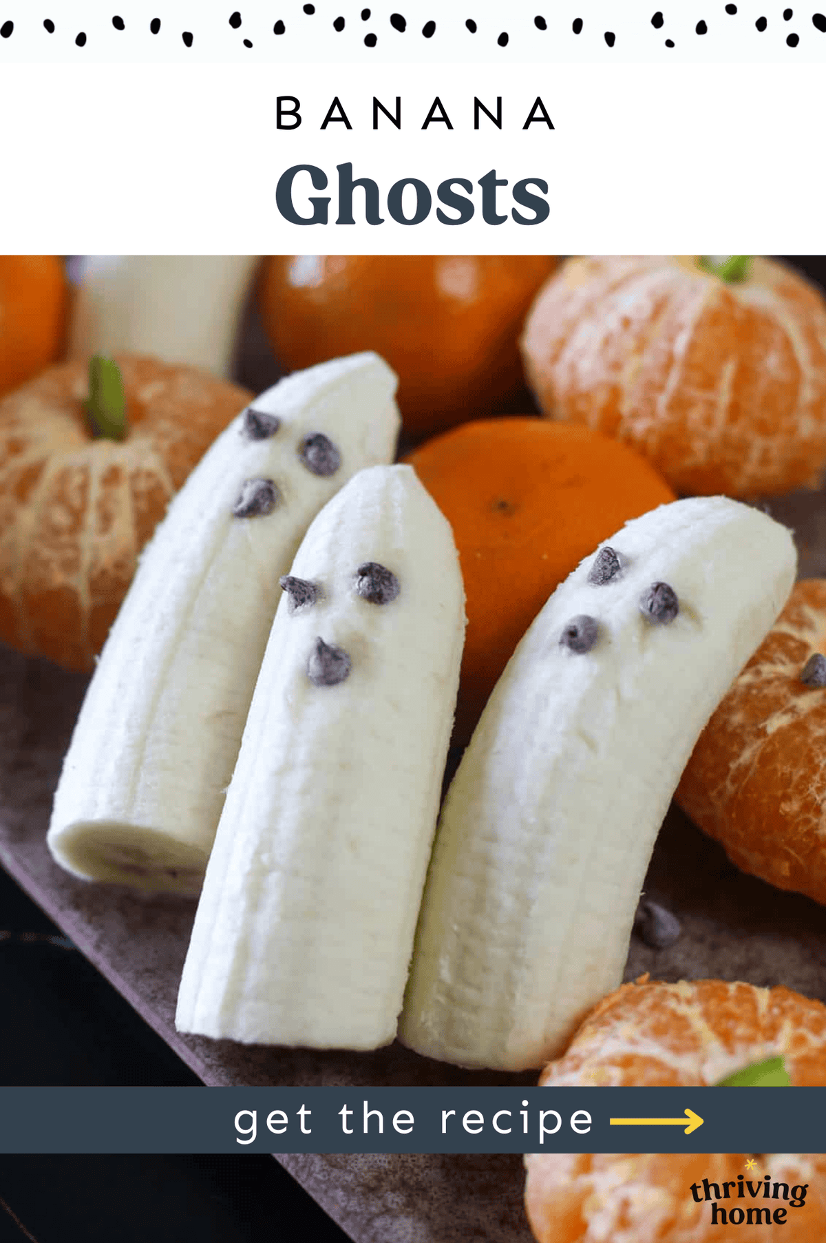 Three banana halves with mini chocolate chips for eyes and regular-size chocolate chips for mouths to look like ghosts.