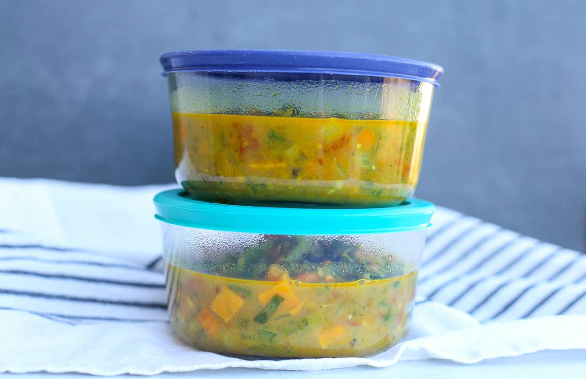 Soup in 2-cup freezer containers stacked up.