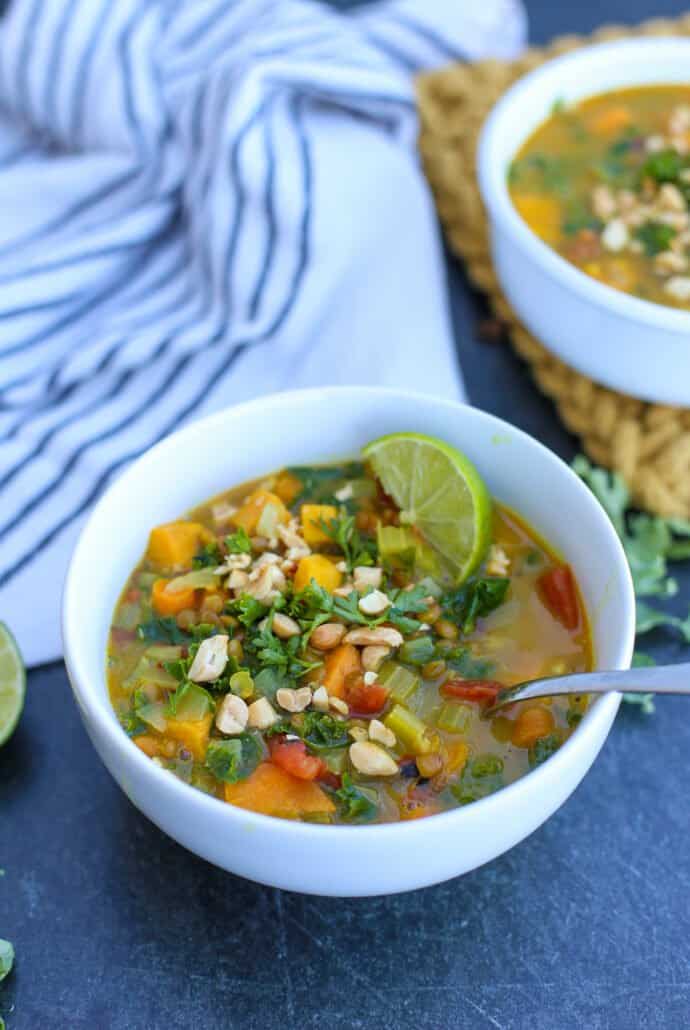 Coconut Curry Lentil Soup in a bowl with a spoon