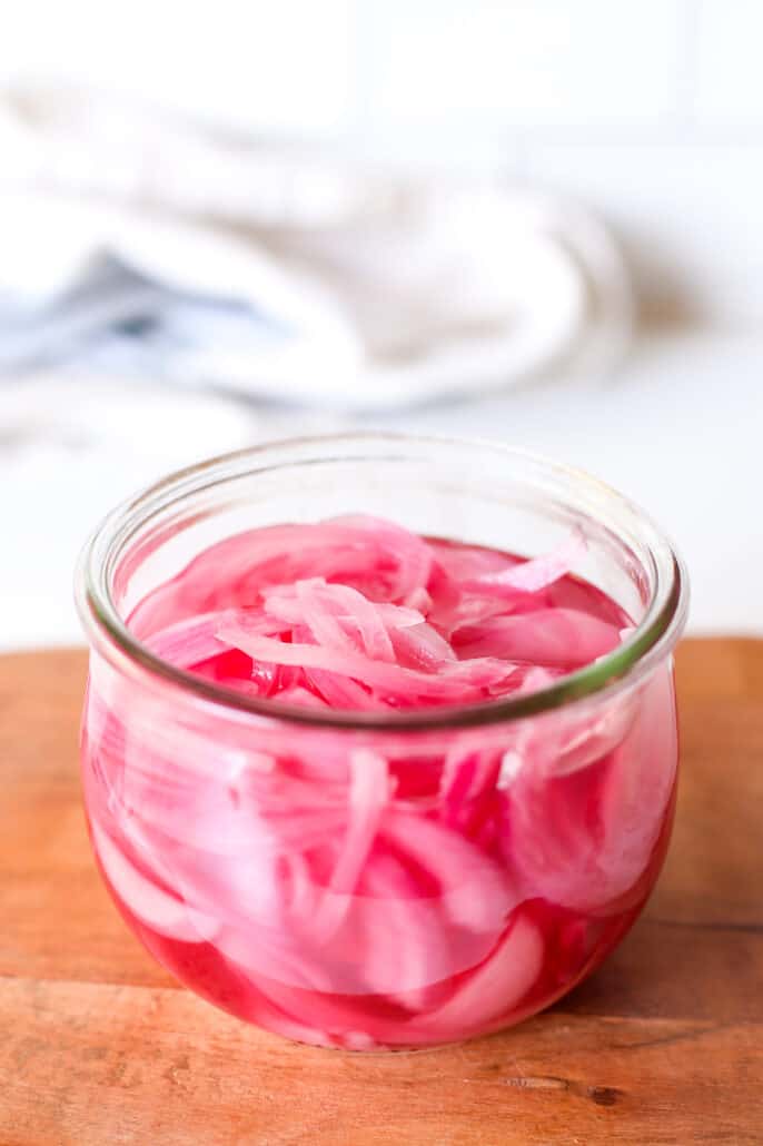 Pickled red onion in a mason jar