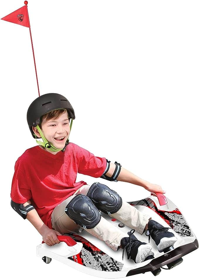Young boy on Electric Ride On Toy.