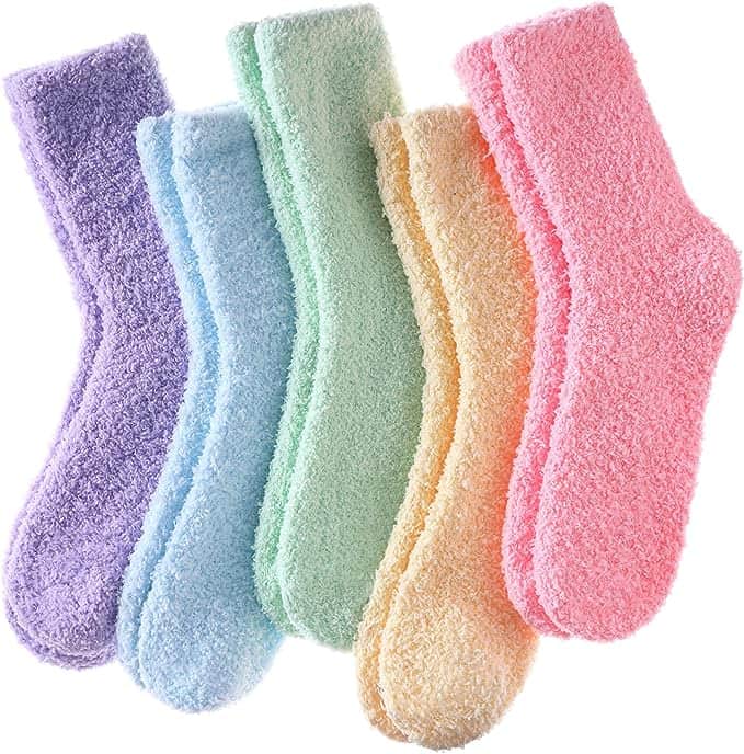 A collection of pastel colored fuzzy socks.