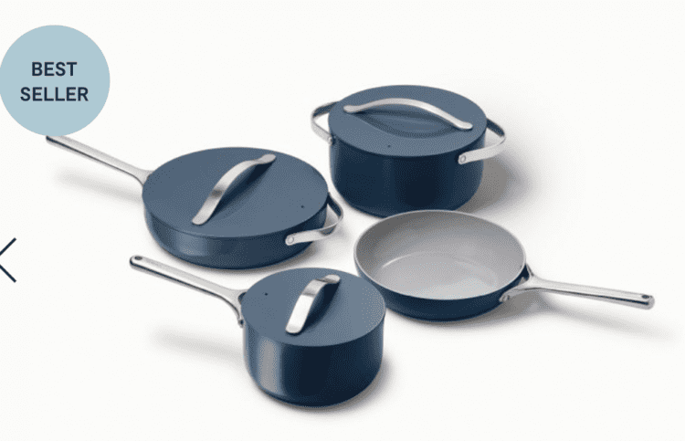 A blue Caraway Cooking Set including four different pans and lids.