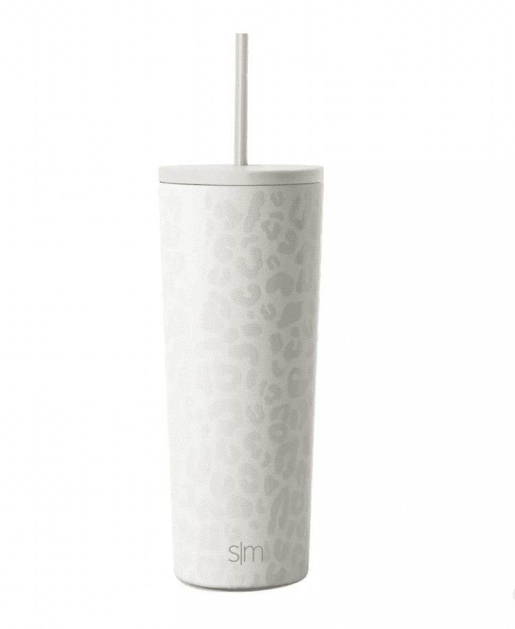 White tumbler water cup with straw.