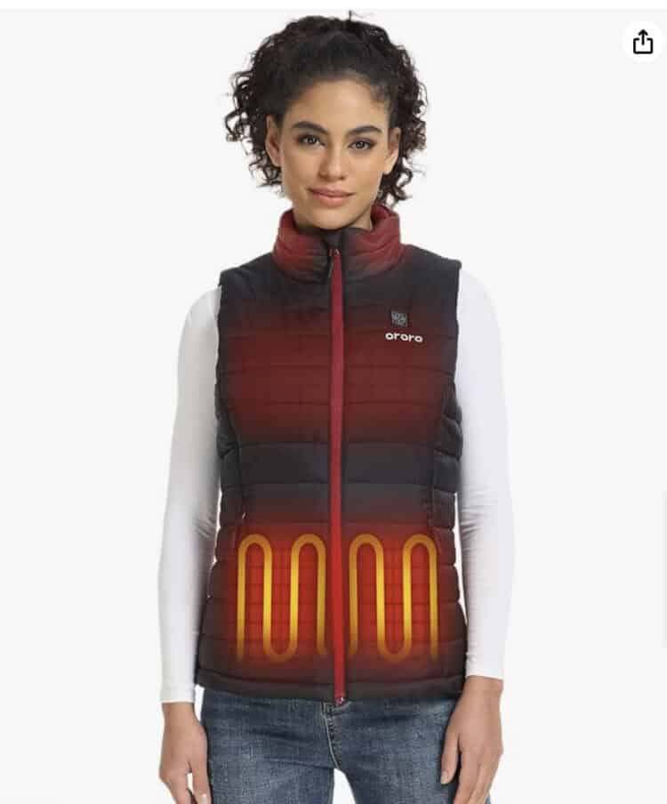 A woman wearing a heated vest.