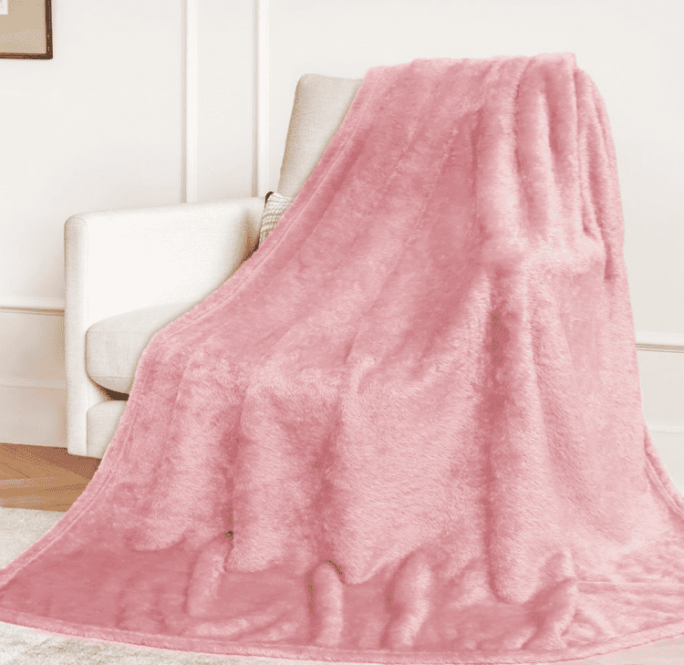 Fuzzy pink throw blanket.