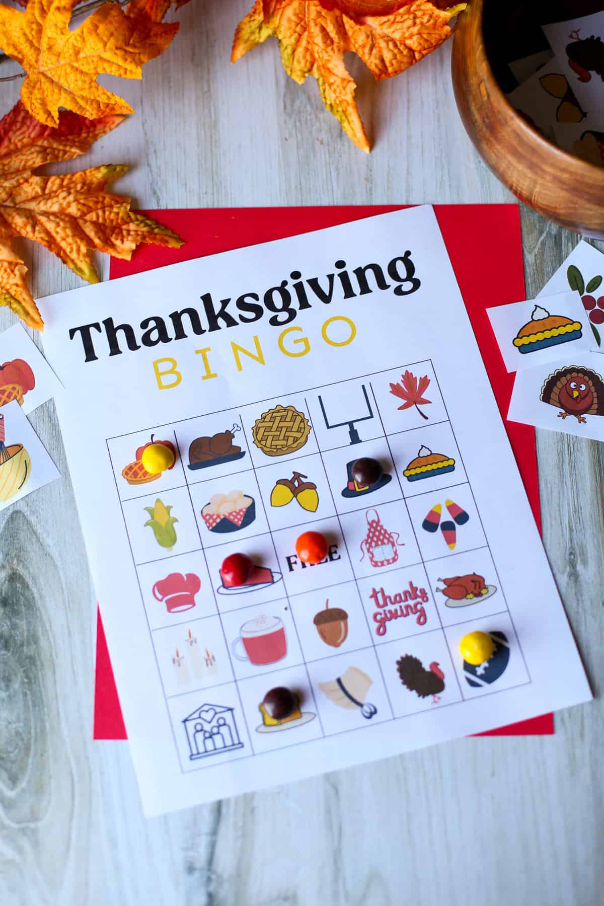 A thanksgiving bingo game sheet with M&Ms as markers. 