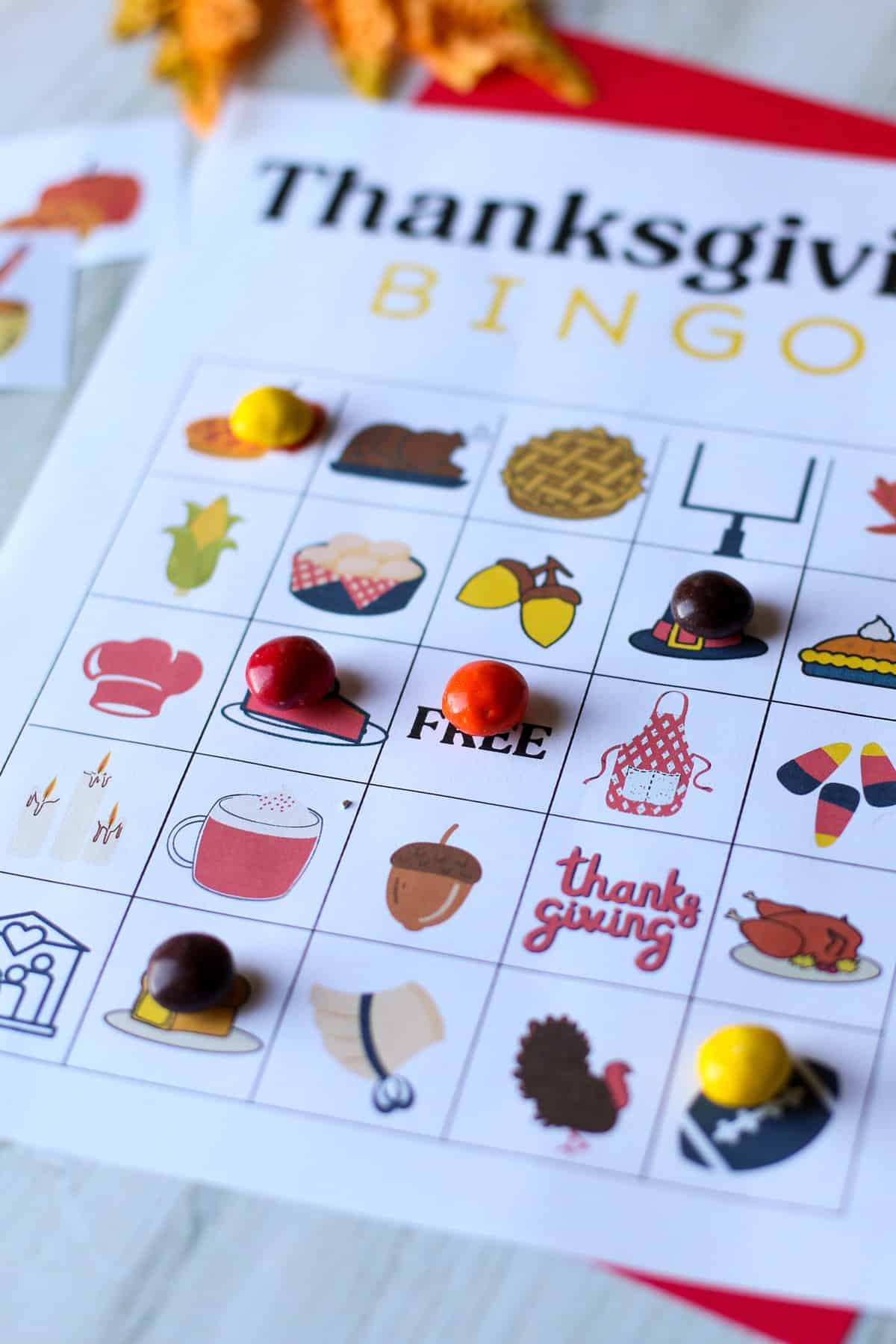 A thanksgiving bingo sheet with M&Ms as markers. 