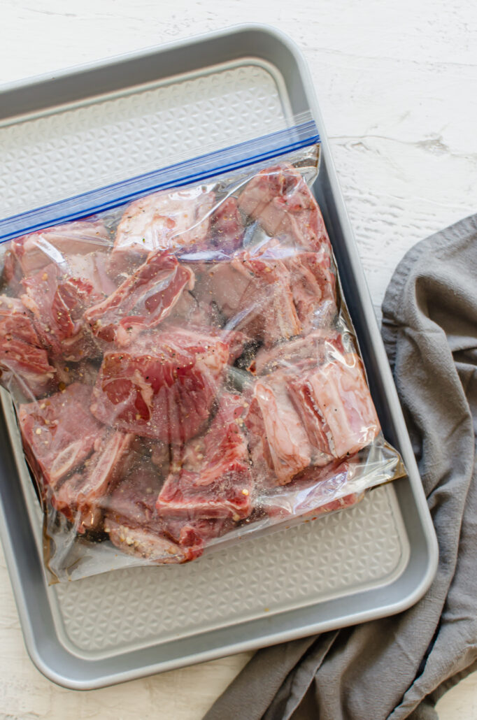 Short ribs and sauce in a freezer bag