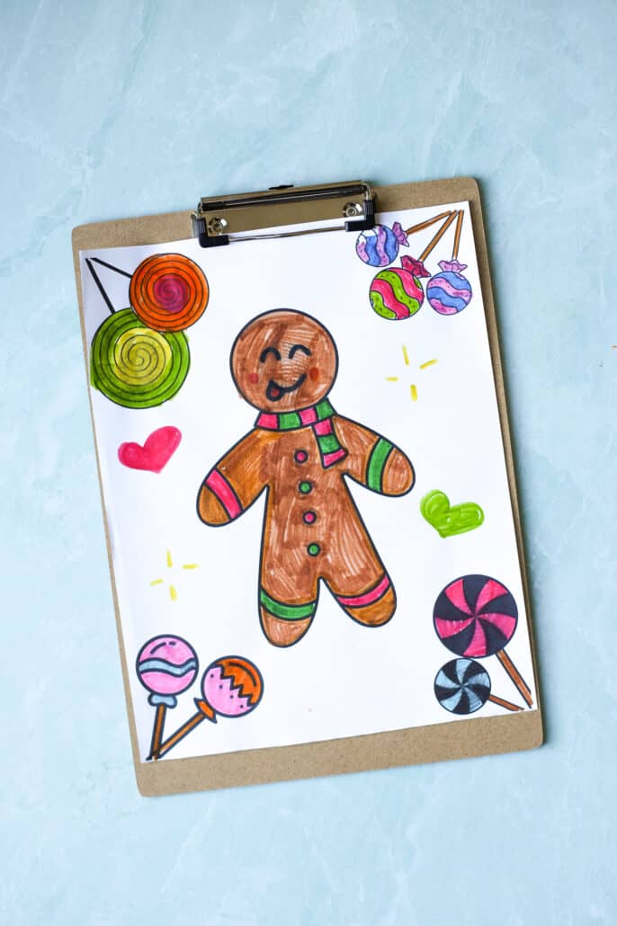 gingerbread man coloring sheet on a clipboard