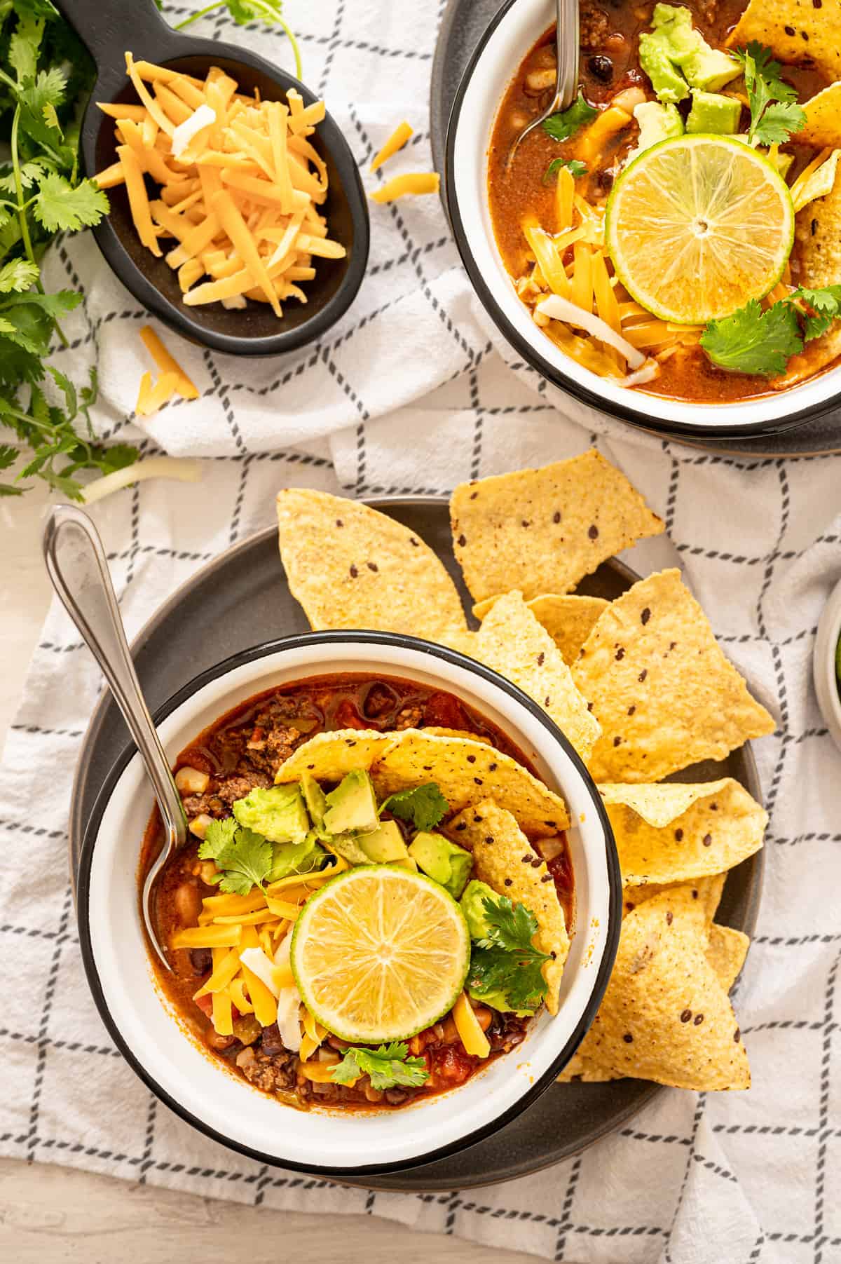 Mexican Soup in a bowl with tortilla chips.