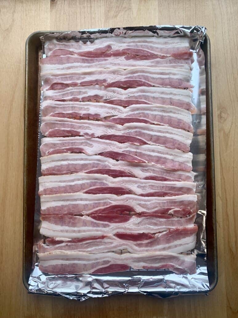 bacon lined up on pan