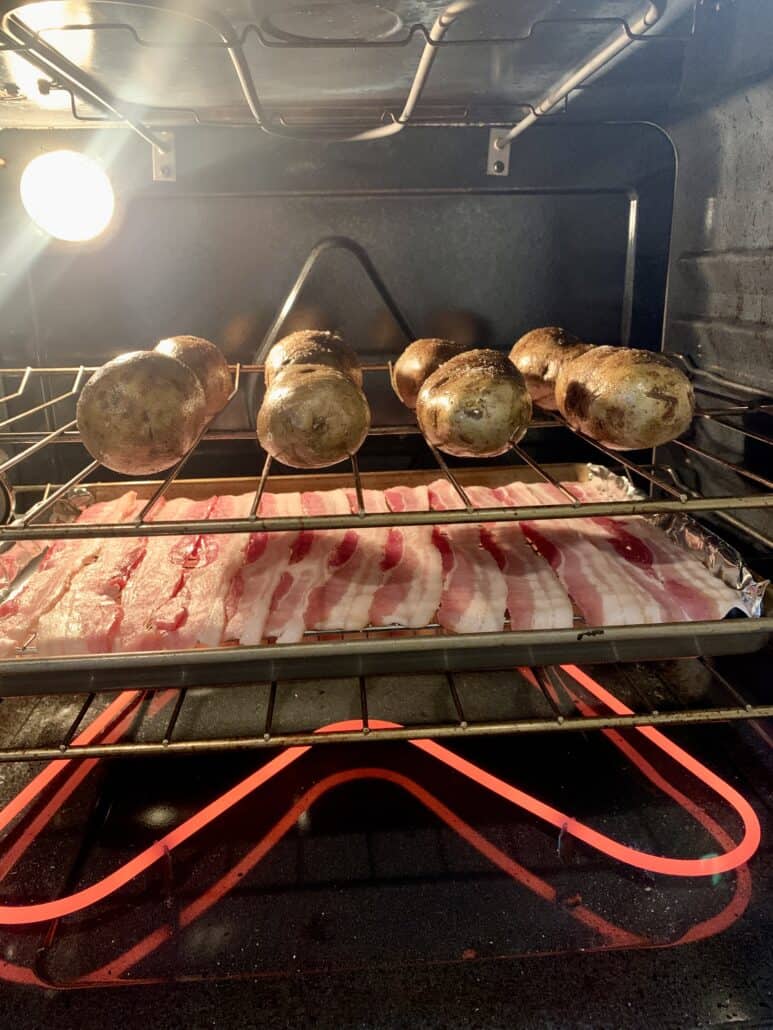 baked potatoes in the oven with bacon for baked potato bar