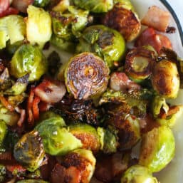 Oven-roasted honey balsamic Brussels sprouts with balsamic drizzle.
