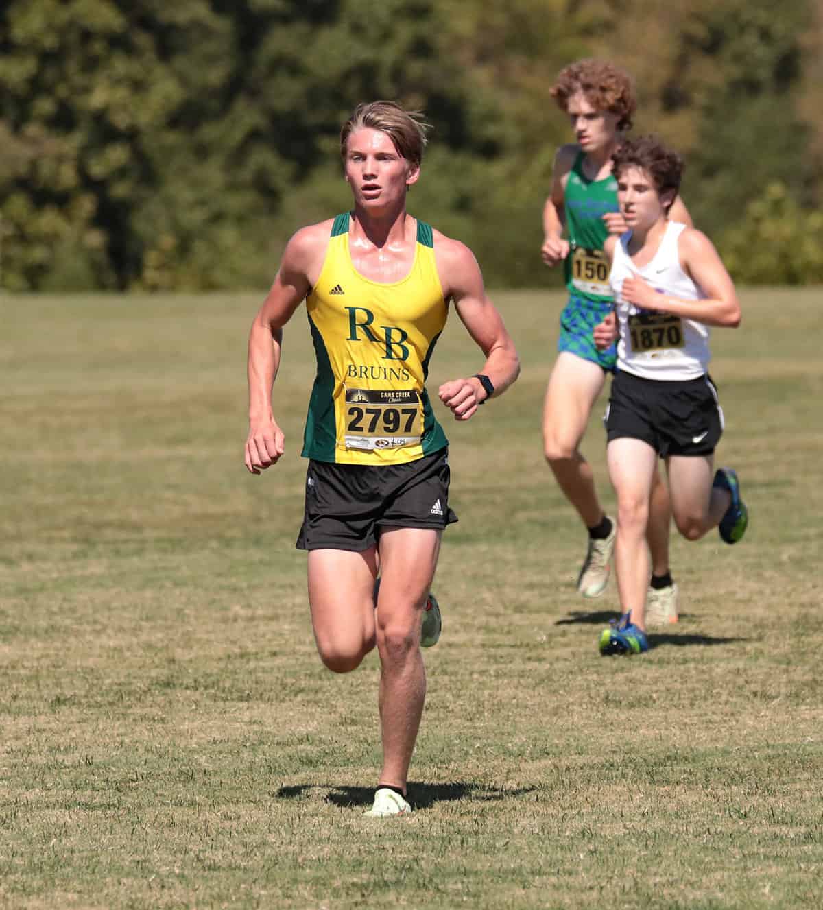 High school athletes running in a cross country meet.