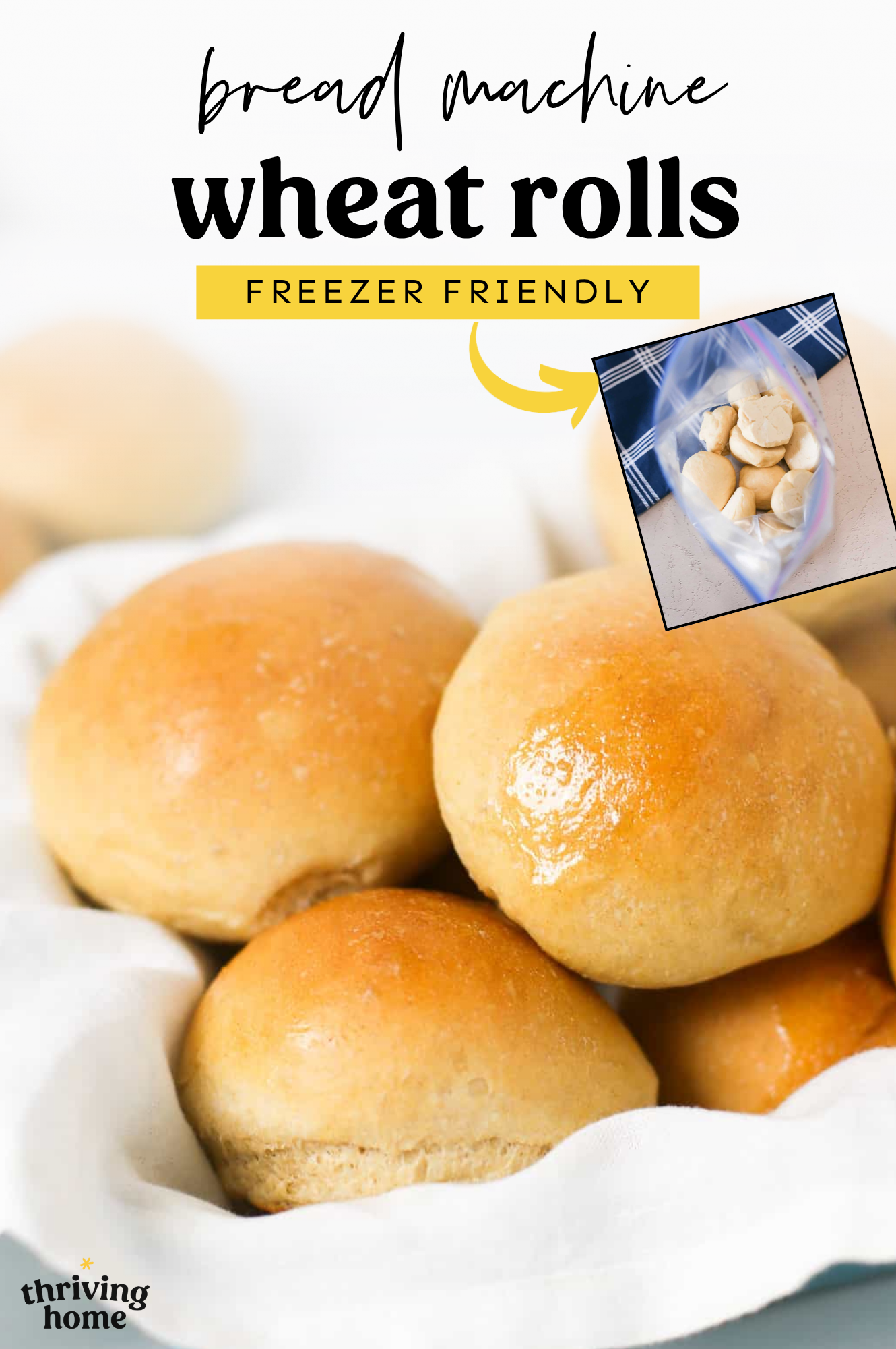 Homemade wheat dinner rolls stacked in a basket.