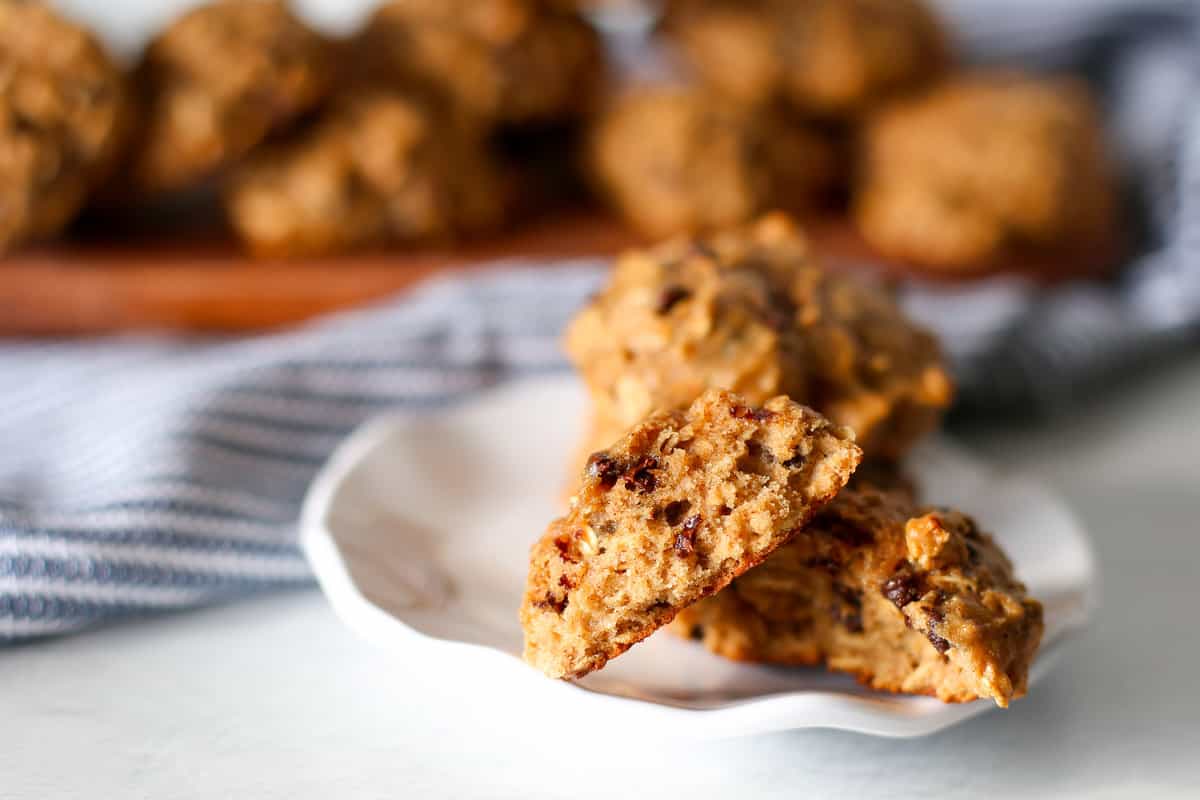 Banana Breakfast cookies on a plate with one cut in half.