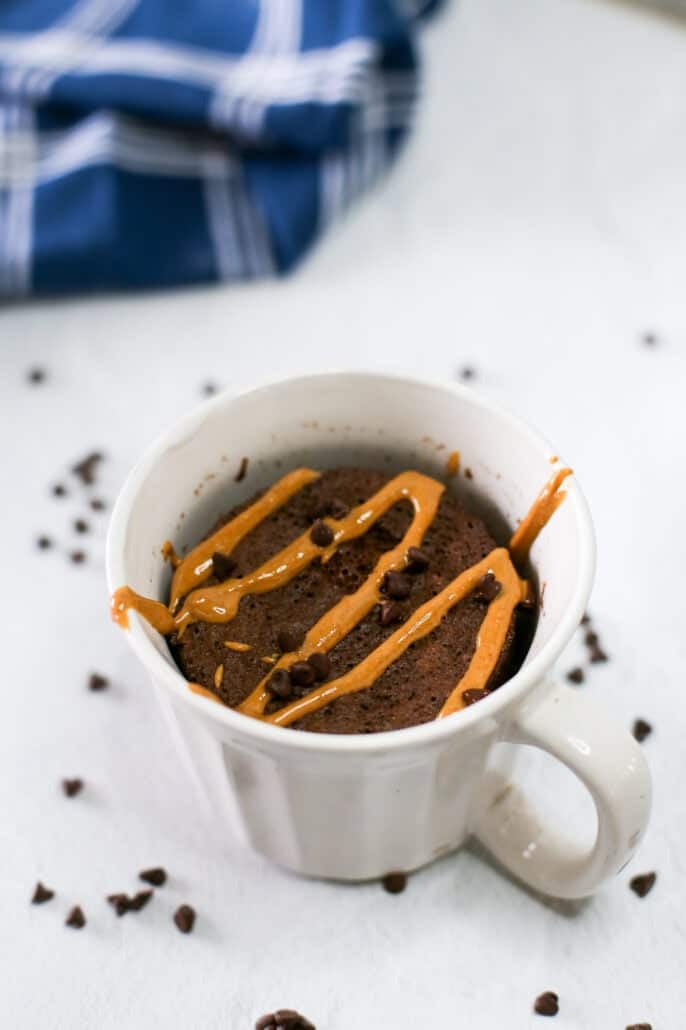 protein mug cake with peanut butter drizzle