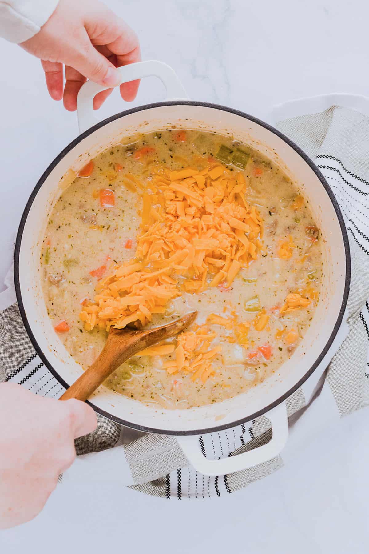 Adding cheddar cheese to cheeseburger soup