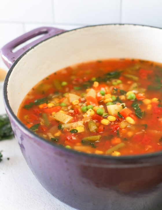 Vegetable soup in a dutch oven ready to be served.