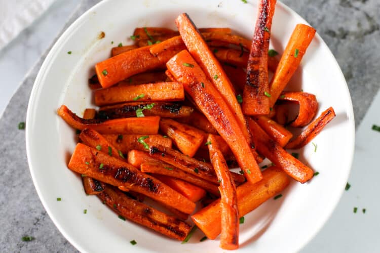 Roasted carrots in a bowl.