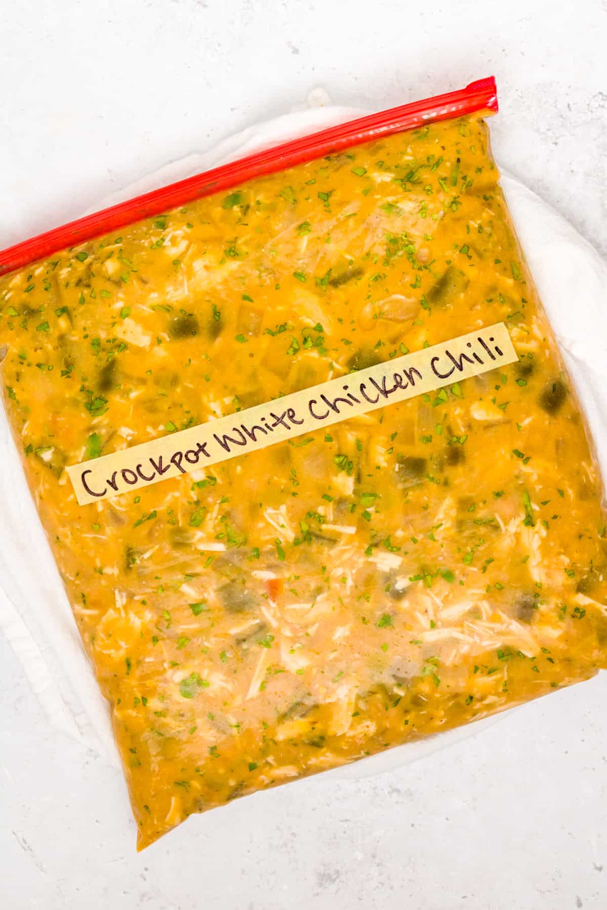 Crockpot white chicken chili in a freezer bag and labeled.