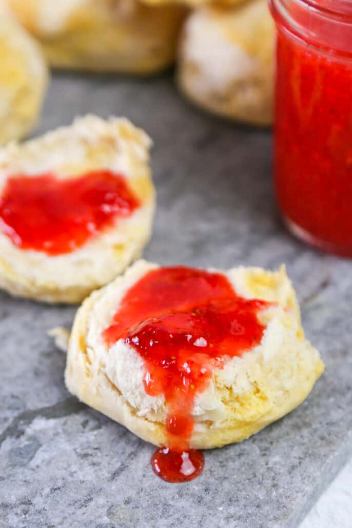 strawberry freezer jam on a biscuit
