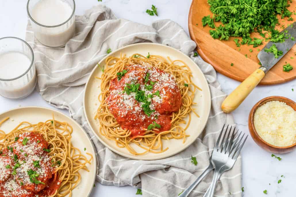 Meatballs on a bed of whole wheat spaghetti with marinara.