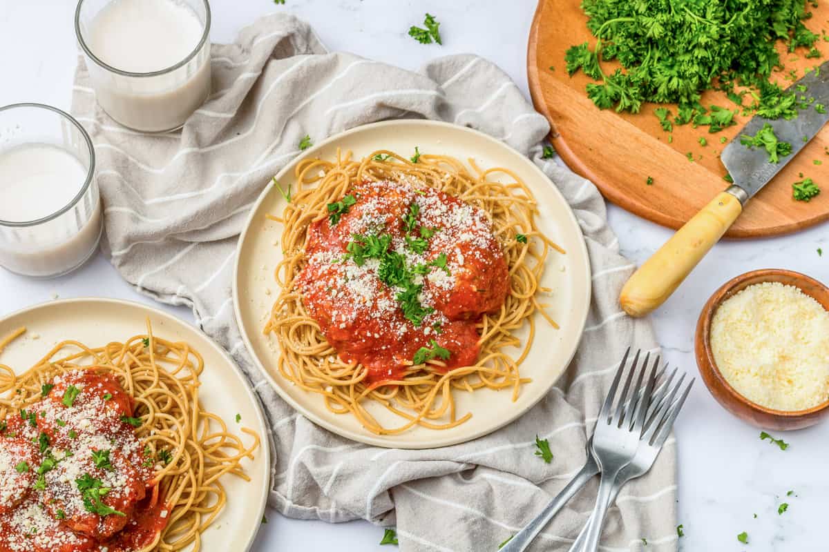 Meatballs on a bed of whole wheat spaghetti with marinara.