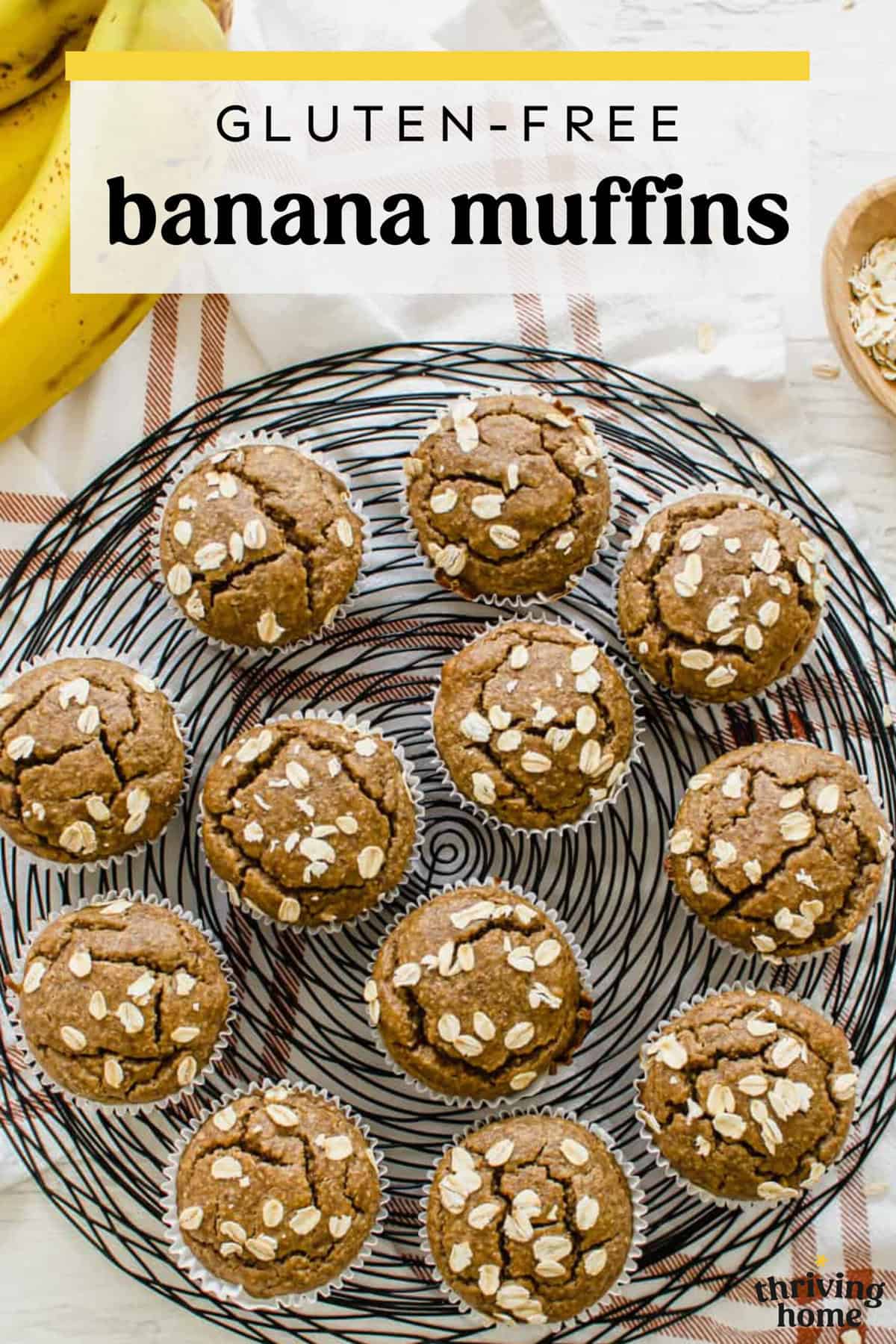 Gluten-free banana muffins on a wire platter.