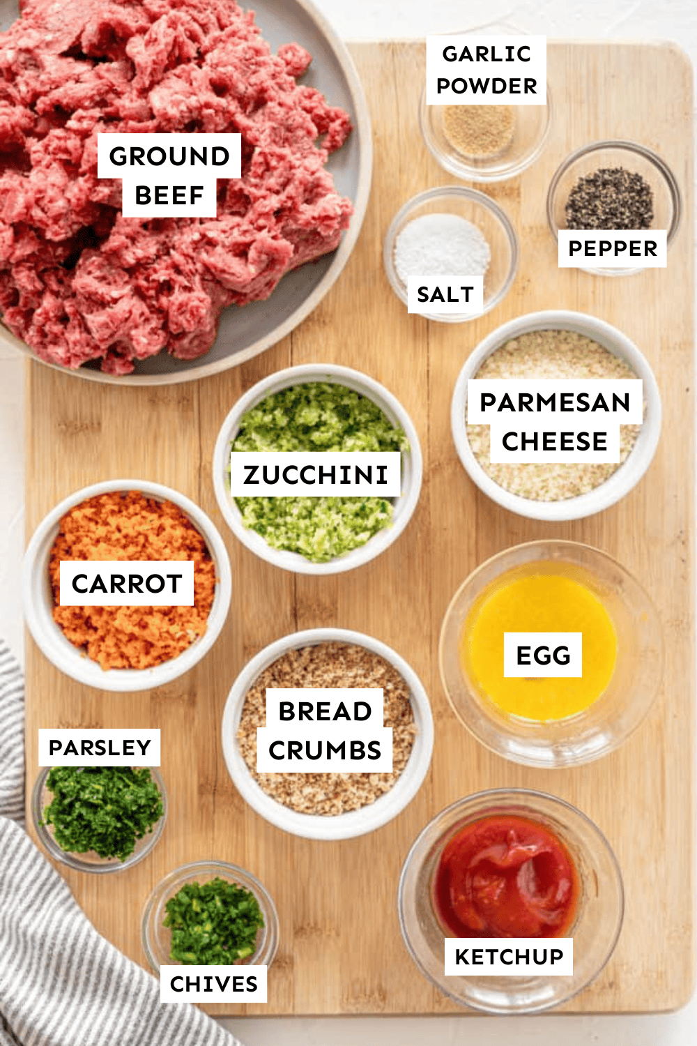 Ingredients for baked meatballs with sneaky veggies measured out and labeled.