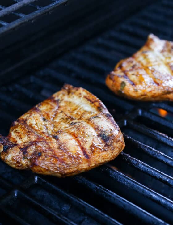 grilled chicken cutlets on a gas grill.