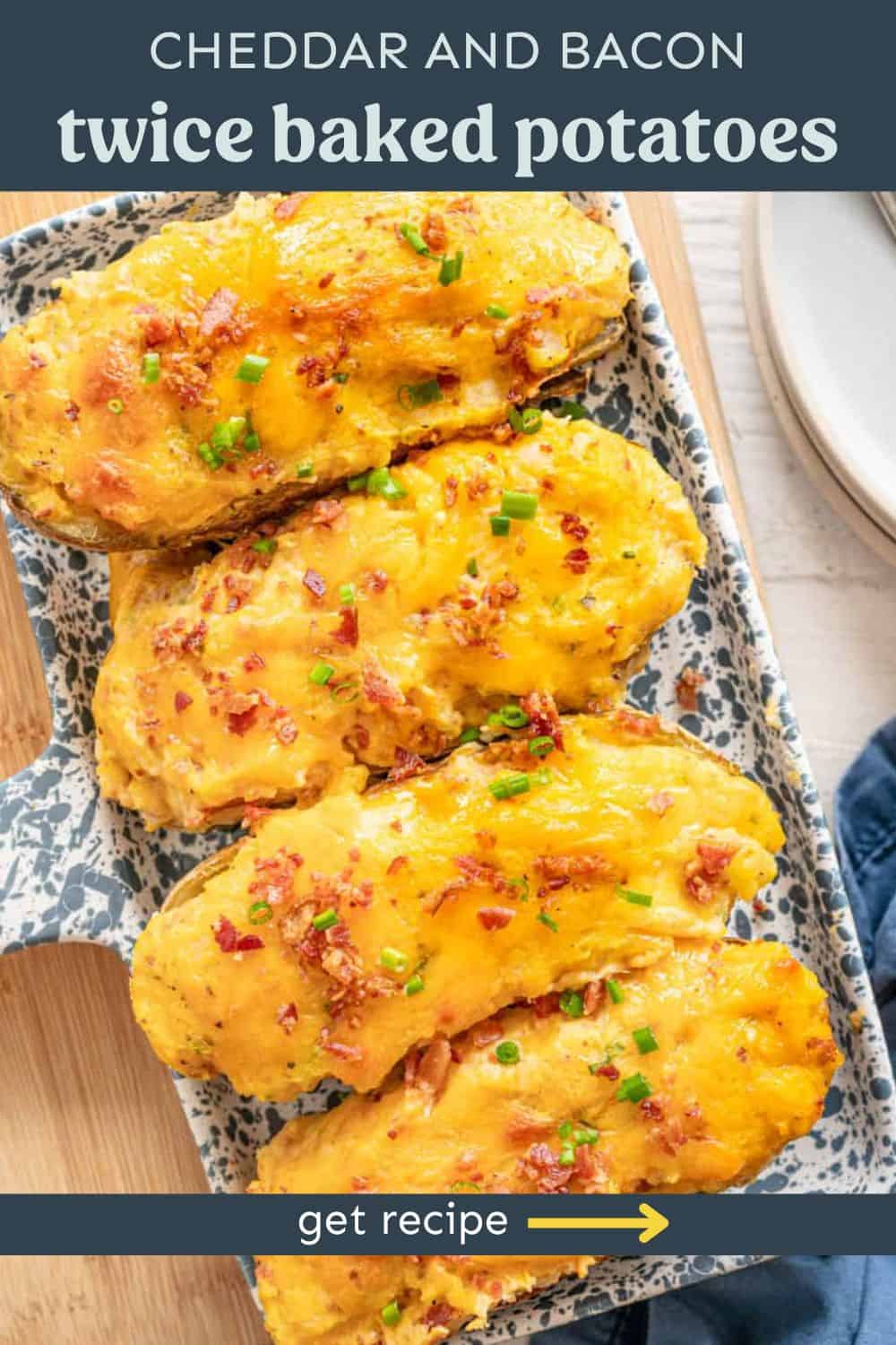 Twice baked potatoes on a serving platter.