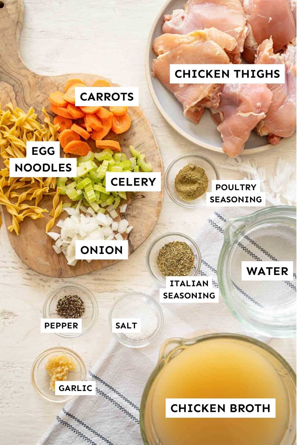 Individual ingredients for Instant Pot Chicken Noodle Soup on a counter.