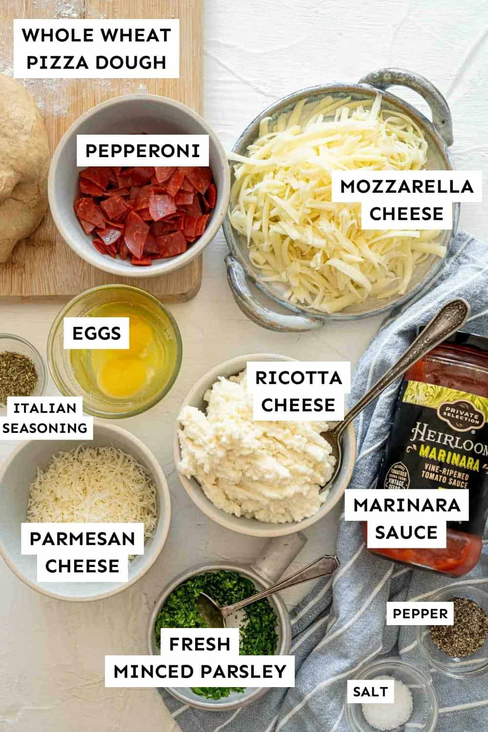 Ingredients measure out and labeled for Pepperoni Calzones.