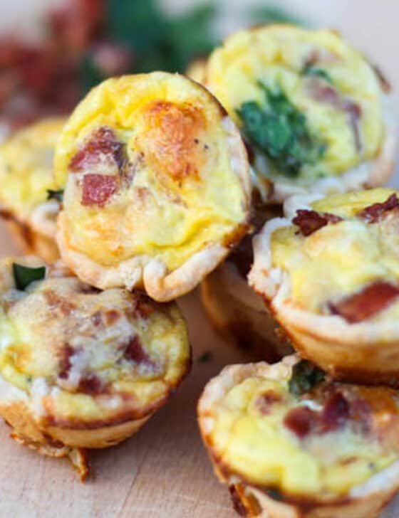 Mini quiches piled on top of each other.