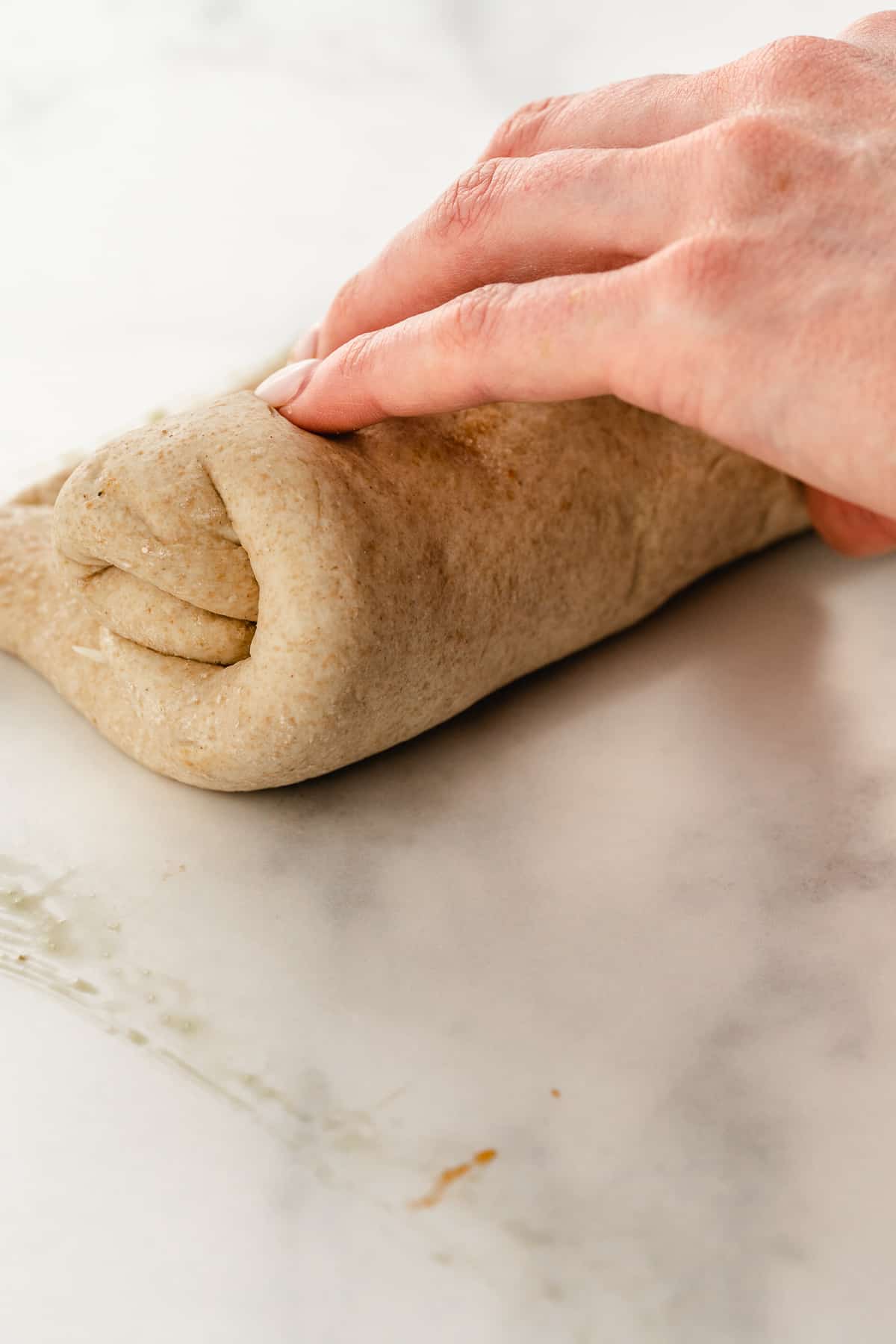 Rolling Stromboli Pizza before cooking
