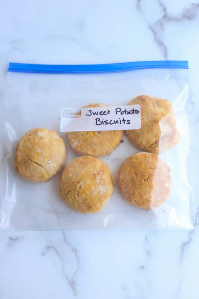 Already baked sweet potato biscuits inside a zip-tip freezer bag and labeled.