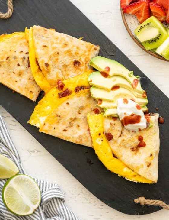 Cut up Breakfast Quesadilla with sliced avocado