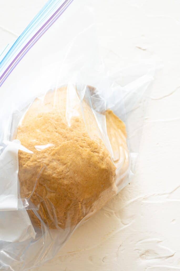 Calzone dough in a gallon-sized bag ready for the freezer.